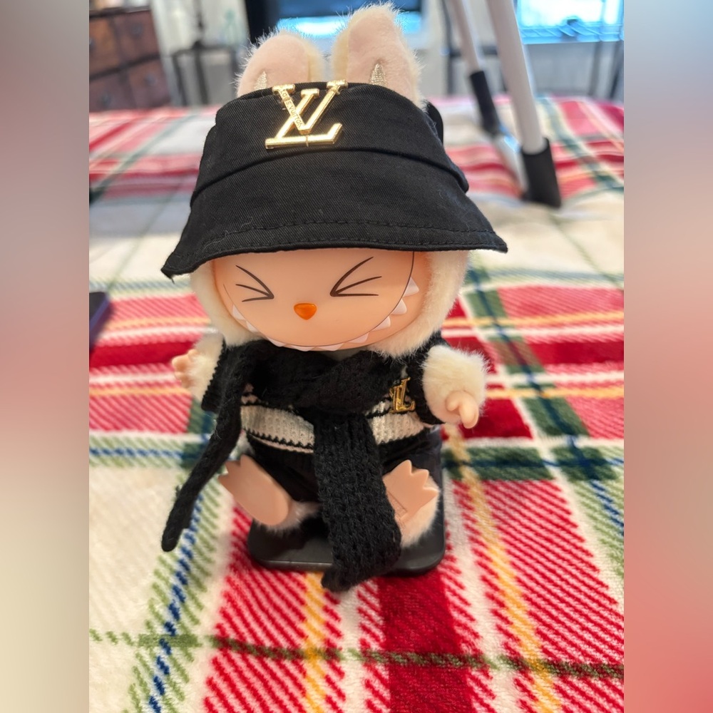 Labubu elegant Black and White Ensemble Gold Accents winter outfit
